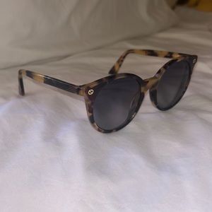 An authentic pair of GUCCI Round GG0091S Sunglasses in Havana.